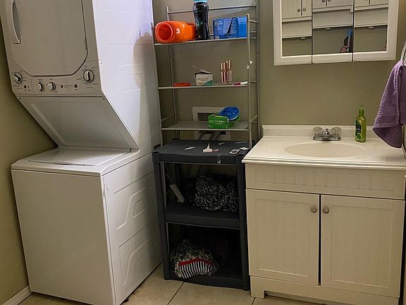 bathroom 2 with laundry area