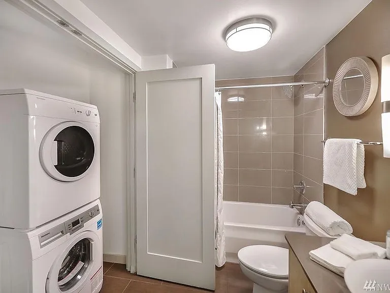 Second bathroom with a separate washer/dryer closet