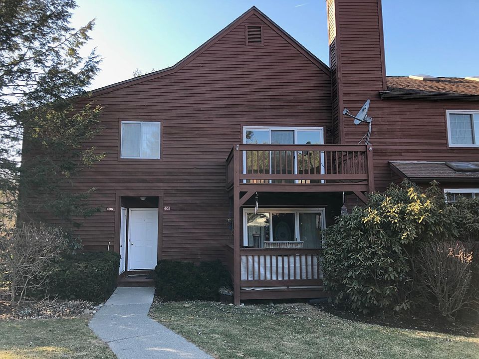 Exterior view of unit - 406 is upstairs