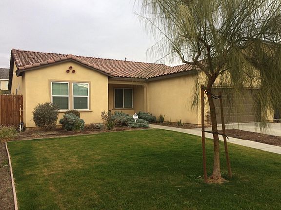 two car garage with auto opener, alarm and fire system.
