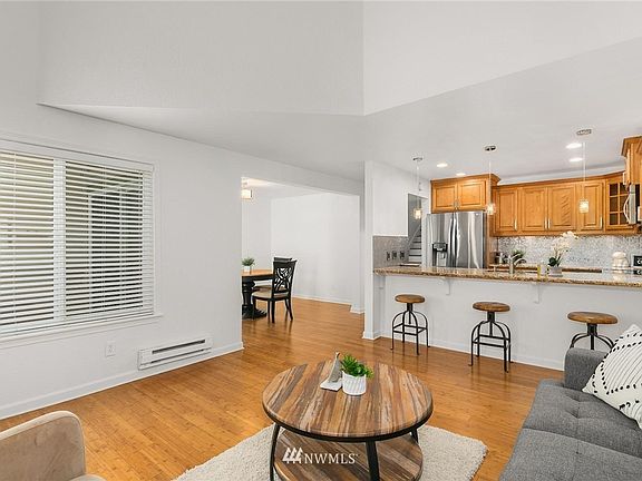 Open floorplan. Kitchen and dining shown. 