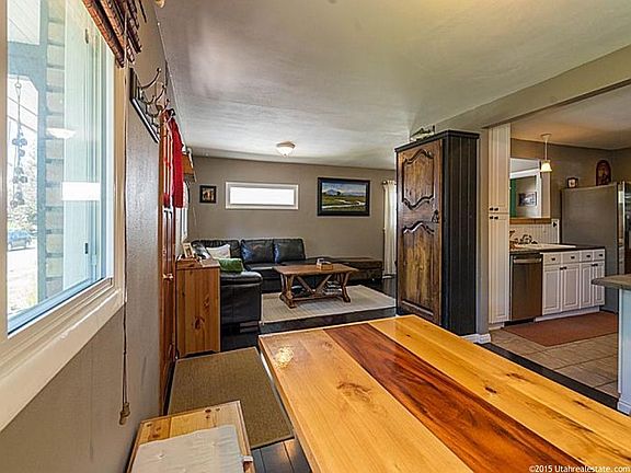 Living room opens to kitchen