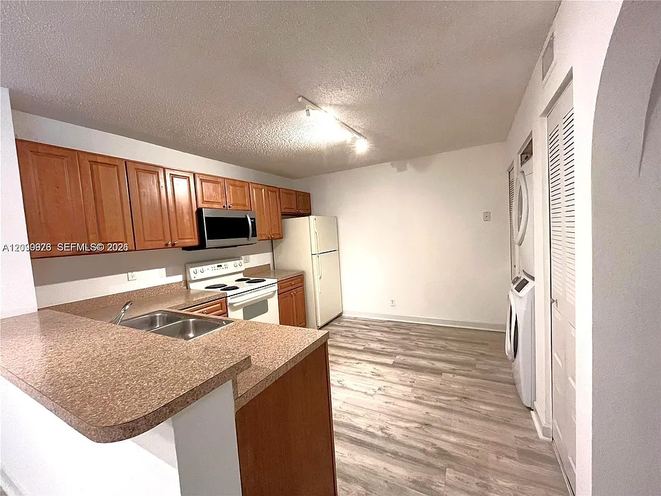 10161 W Sunrise Blvd #203