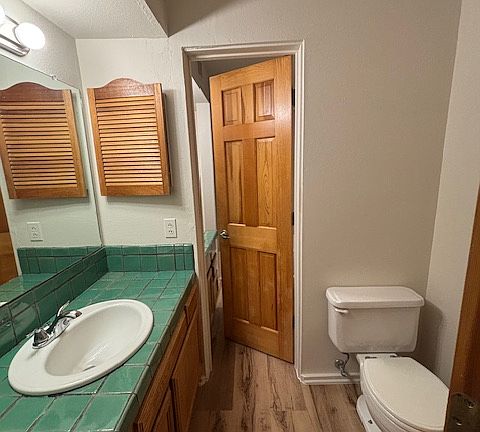 Half bath with a door to Master bedroom and a second door to full bah.