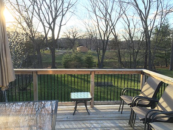 Deck overlooks backyard