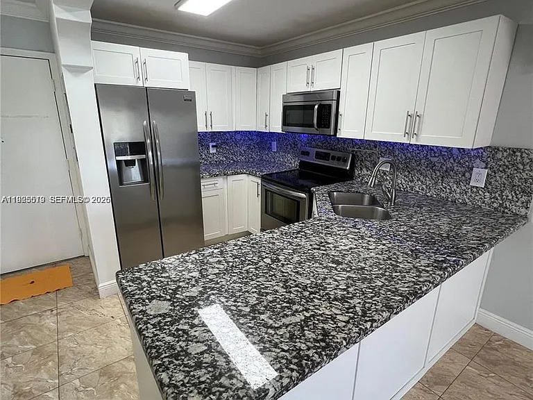 1075 W 68th St #218 — Photo 4