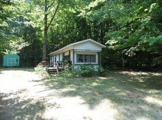 9010 Whispering Pines Dr, Mancelona, MI 49659