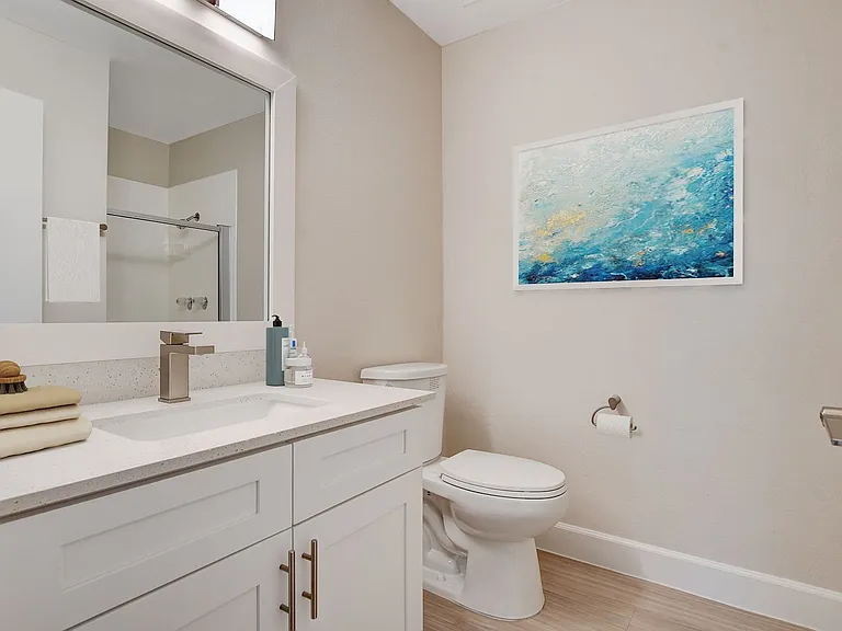 Elevate your lifestyle at Invitational with modern bathrooms featuring stylish fixtures and serene decor. Enjoy the perfect blend of comfort and elegance. Schedule your tour today to see your new home!