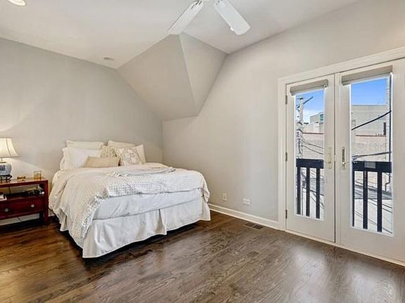 Master bedroom with custom closet and en suite bathroom