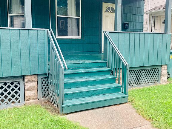 front of house, covered porch with security light
