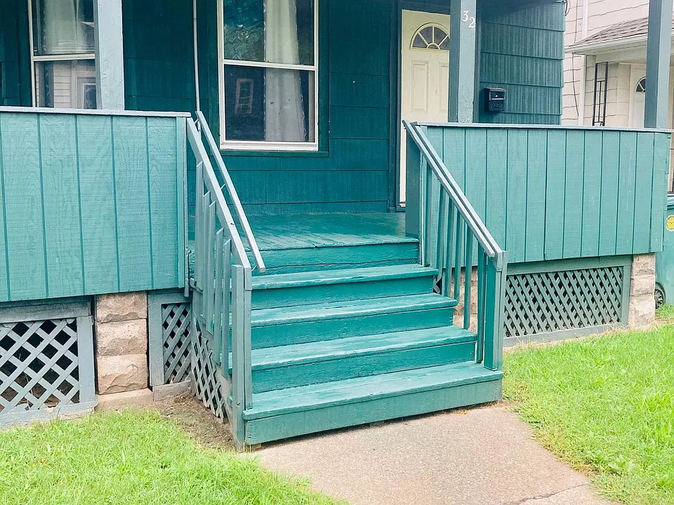 front of house, covered porch with security light