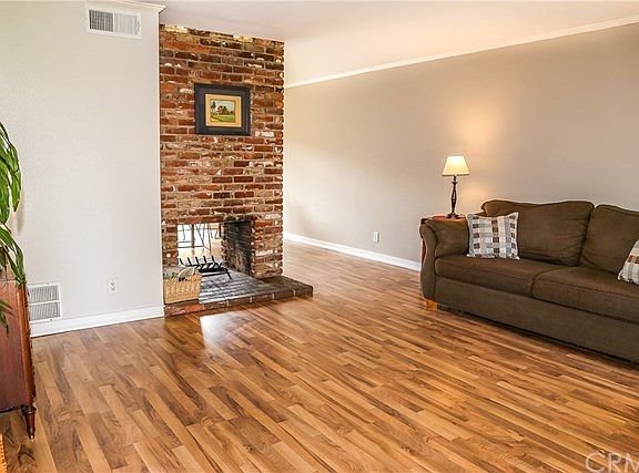 Another shot of the living room, looking at the 2 sided fireplace