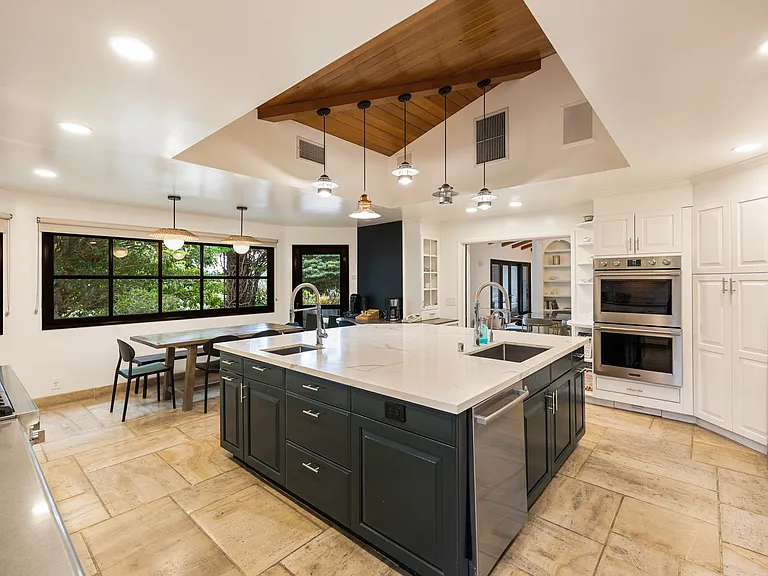 Unique design details and windows that frame the lush outdoors.