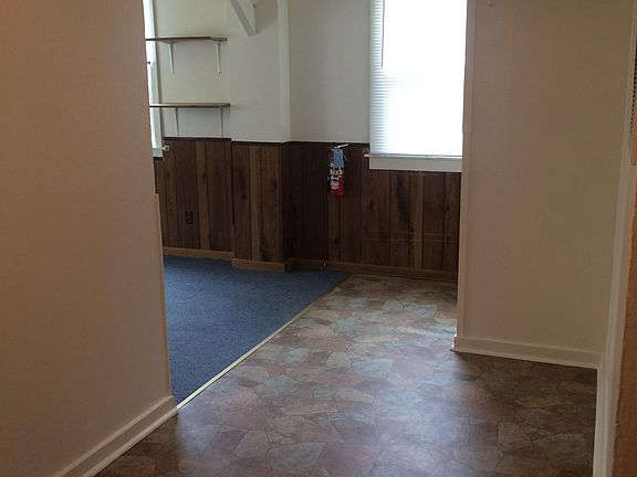 Room off the kitchen to the left. Lots of extra space.