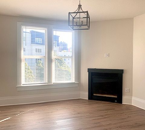 Beautiful living room with natural light from South facing windows.