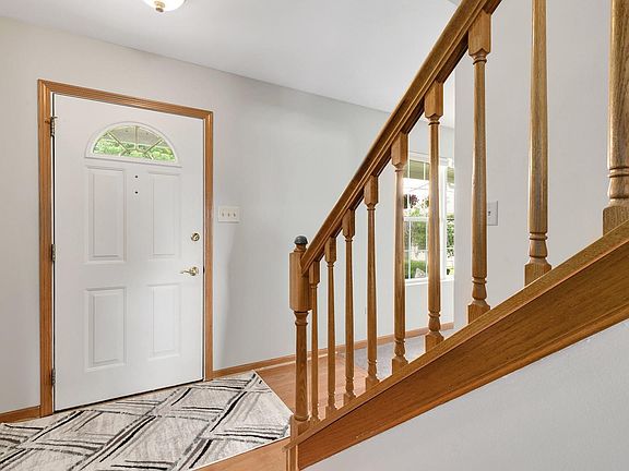 Nice Size Foyer with Hardwood Floors and a Double Door Front Hall Coat Closet.