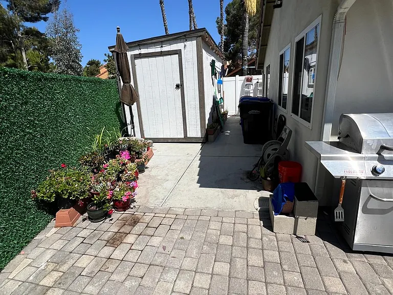 Private Side Yard with Storage Shed