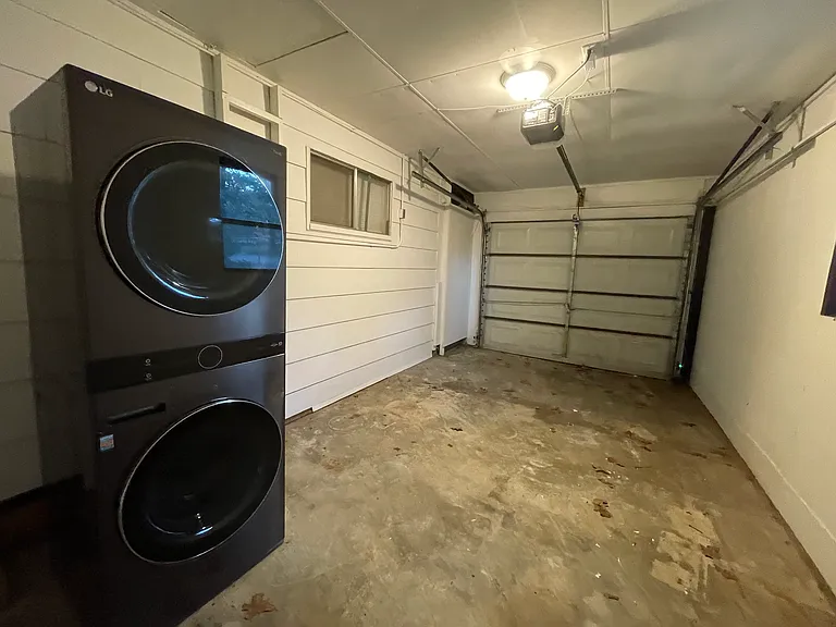 Washer and dryer in the carport