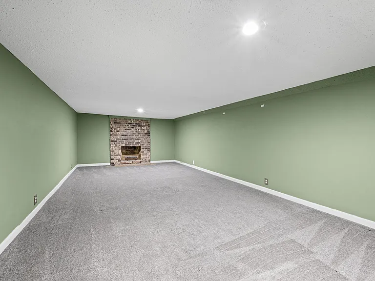 Finished Basement space with fireplace