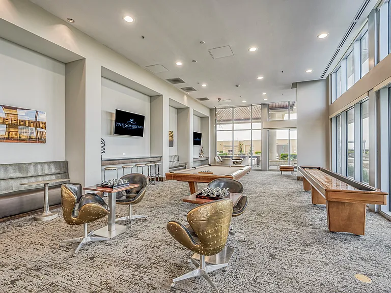 Shuffle board, billiards, and more in our game room