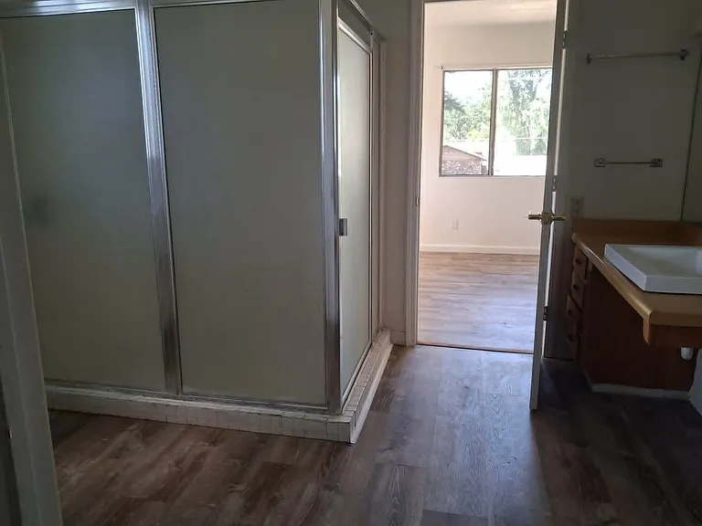 Bath/shower, looking toward front bedroom