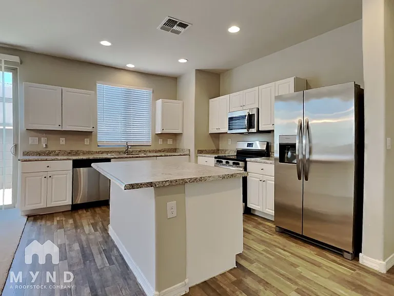 5420 W Albeniz Pl — Photo 7