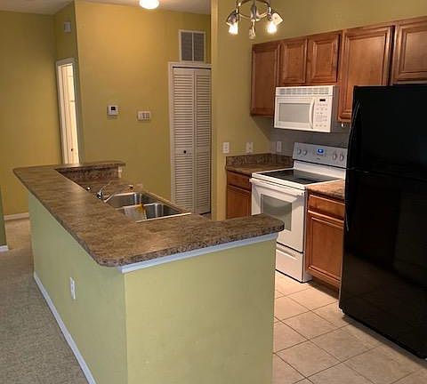 2nd image of 6151 Metrowest Blvd Unit 208