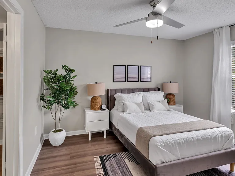 Enjoy an expansive master bedroom with ample square footage, large windows, and an extra linen closet.