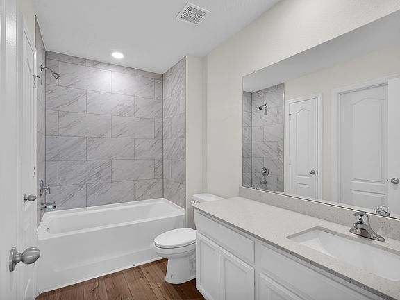 Get ready for the day in the beautiful bathroom