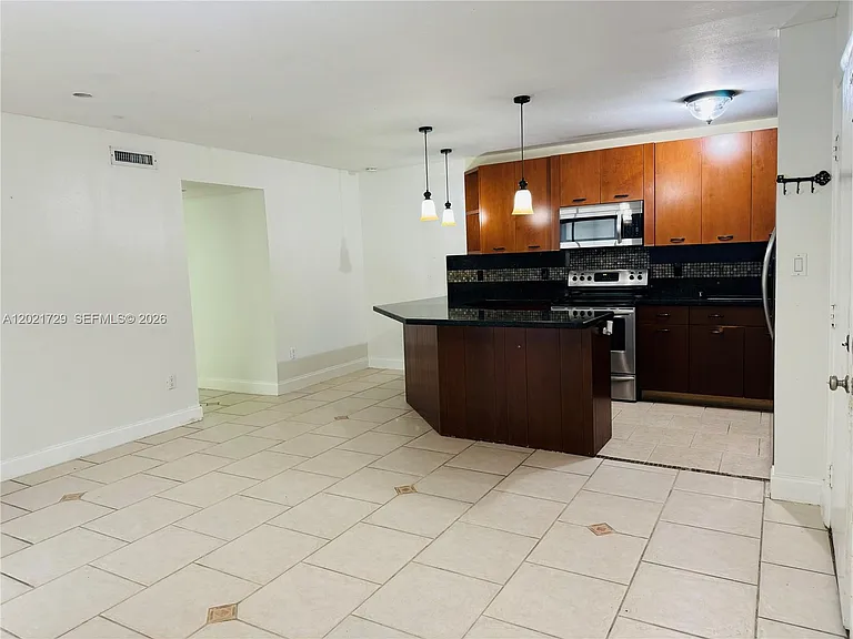 9715 Hammocks Blvd #105 — Photo 2