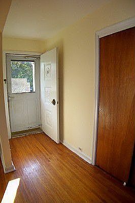 Foyer with Hardwood Floor, Freshly Painted