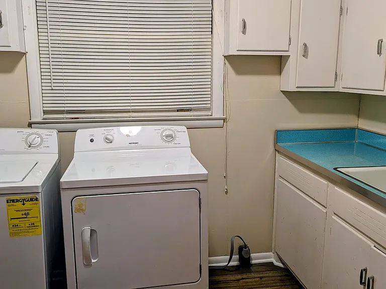 Washer/dryer in the large laundry room.