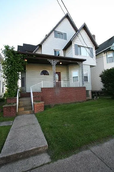 Front view of the building with Maintained Lawn