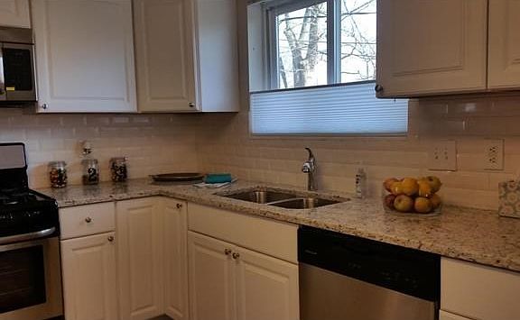Updated kitchen is visually appealing but also has plumbing and electrical improvements.  New garbage disposal and gas cooking are part of the package!