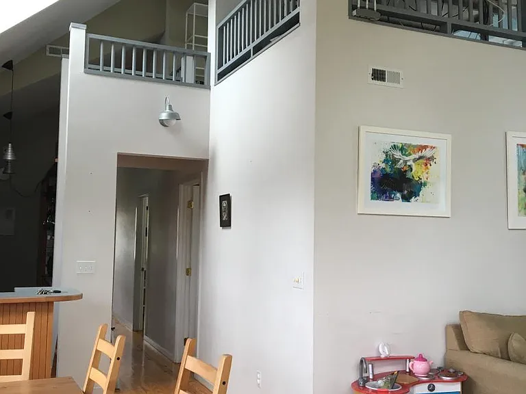 Dining room looking to loft and down hall