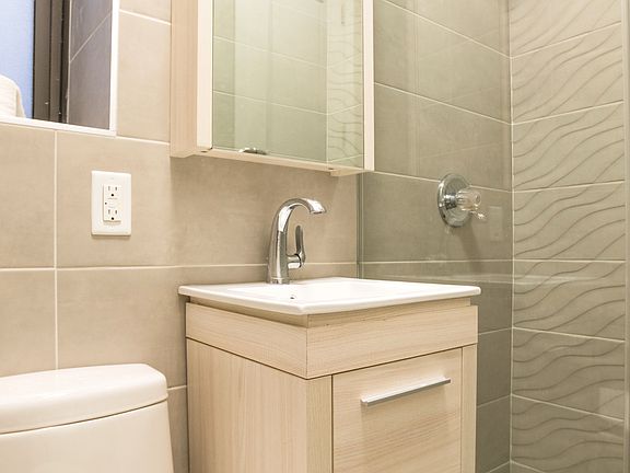 4th image of 212 E 13th St APT 2D