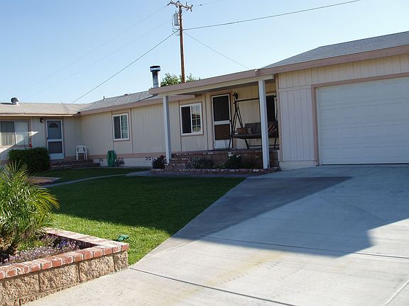 front yard with large covered porch