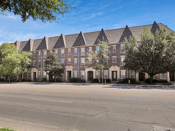 Front of townhomes with street parking in front