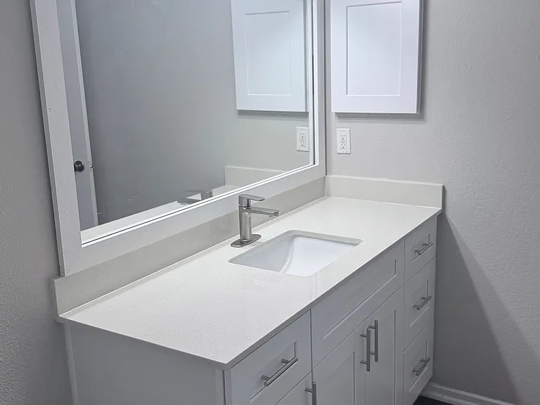 White Vanity with Quartz Countertop
