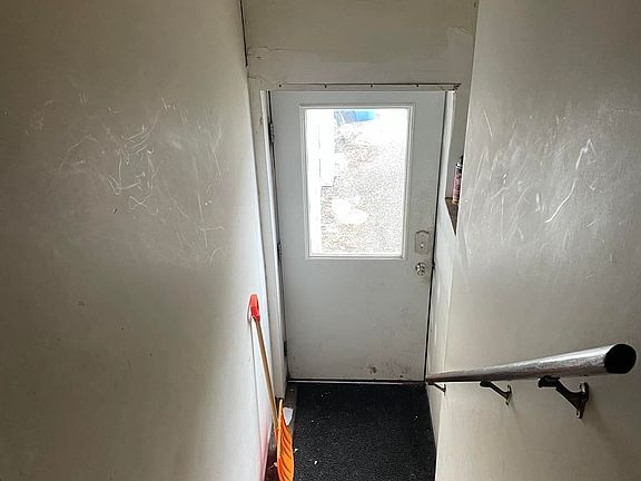 Stairs going into the apartment from the top