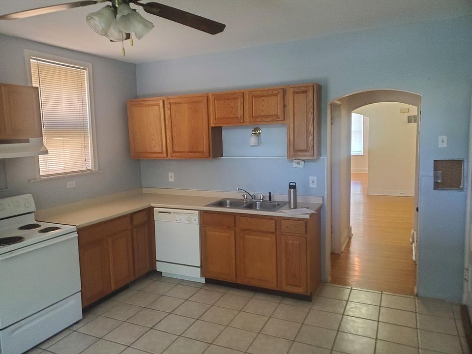 Kitchen from exterior door to balcony