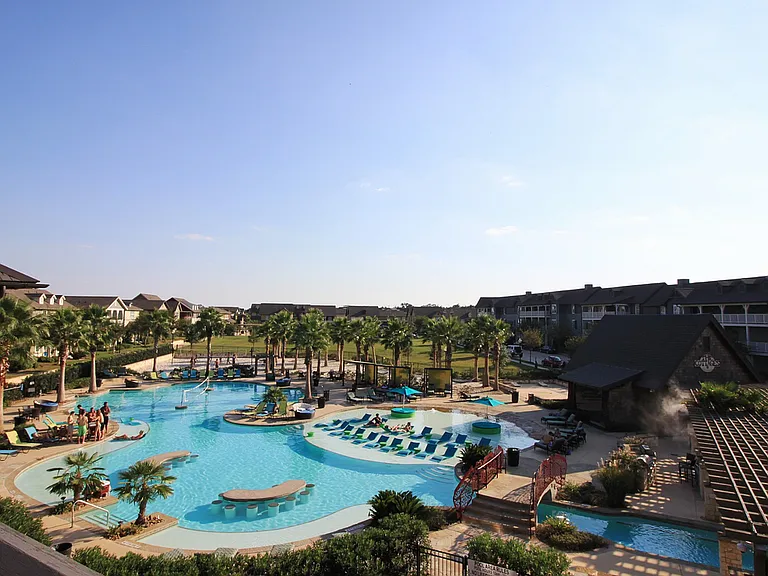 Experience resort-style living with our exquisite pool and lush surroundings.