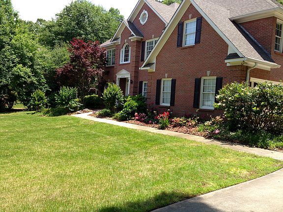 Walk path. Huge front lawn