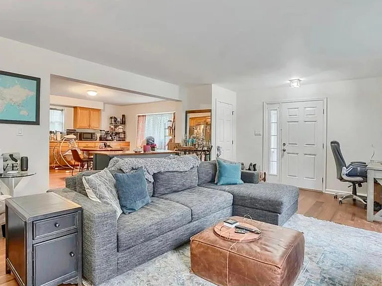 Living room into dining area and kitchen.