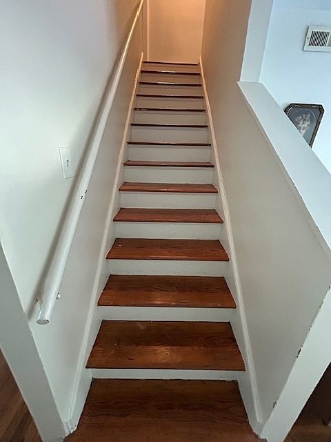 staircase leading to bath and 2 bedrooms