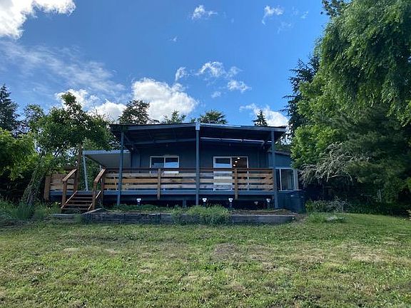 View of covered deck from back yard