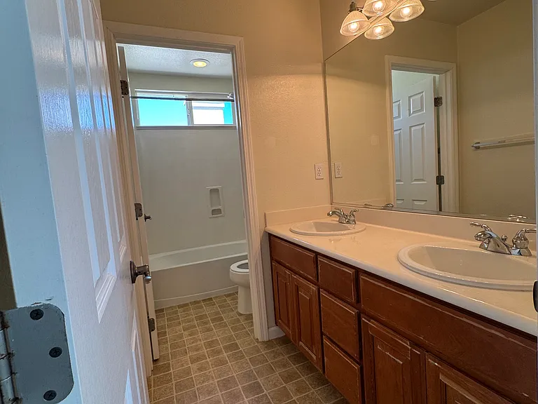 Upstairs Double Vanity Bathroom w/ Separate Toilet and Tub Shower Room
