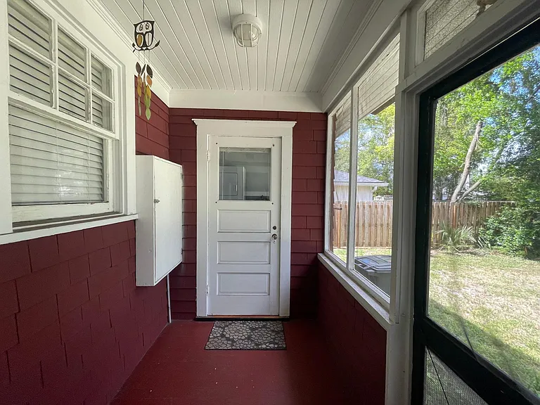 View of the backdoor from the backdoor of the other side of the duplex.