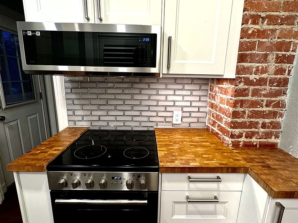 Kitchen with all new appliances and new cabinets.