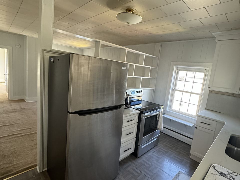 Kitchen with new cabinets, appliances and countertops.